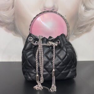 Elegant Black Quilted Handbag with Silver Accents